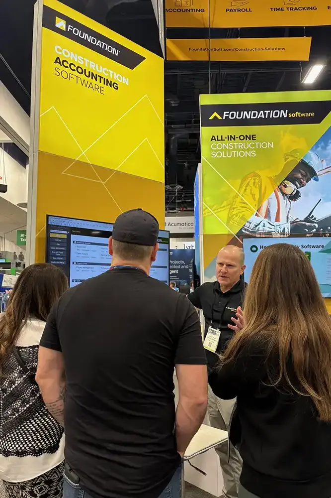 Garret Fuller explaining the benefits of our construction software to event attendees